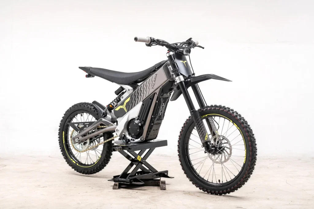 Talaria X3 with dirt wheels on the trail